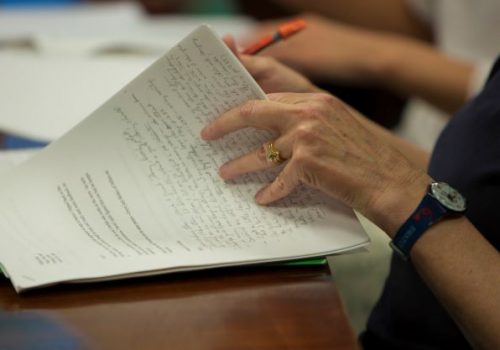 Person writing in a notebook